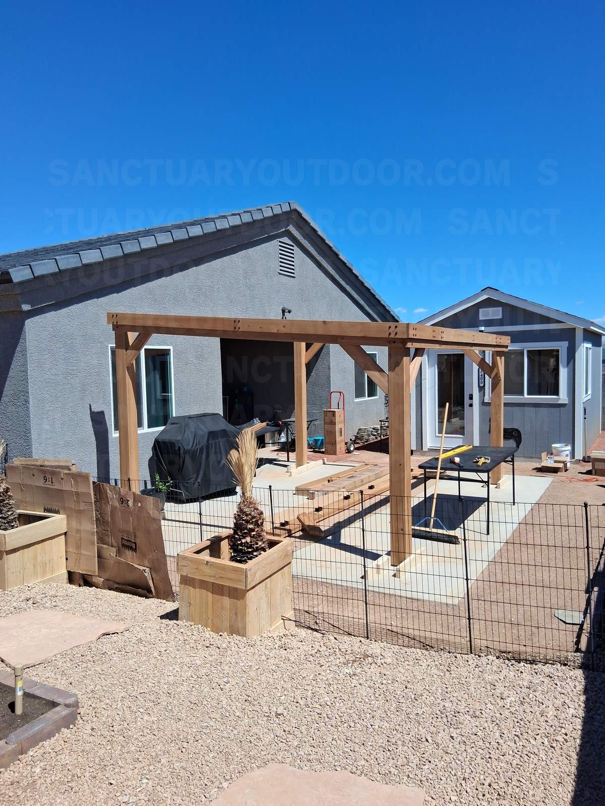 Golden Valley landscape design with pool and outdoor kitchen